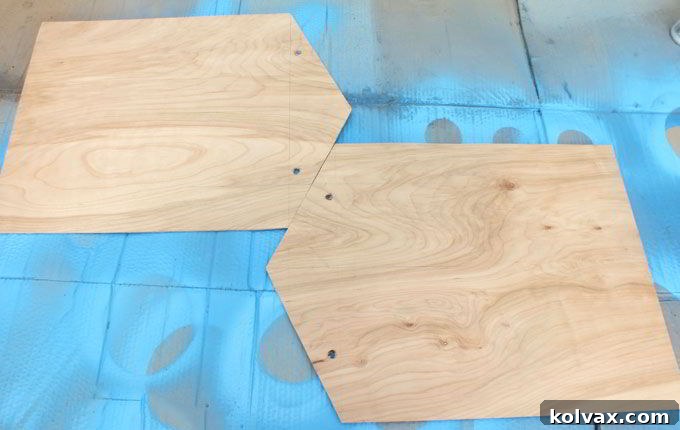 Cutting the main sled pieces from a single sheet of plywood for Frozen Ice Block Races