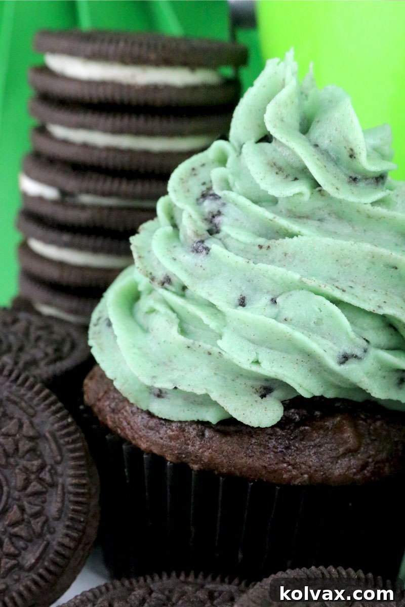 A top-down view of multiple cupcakes generously frosted with Mint Oreo Buttercream, showcasing their enticing appearance and delicious appeal.