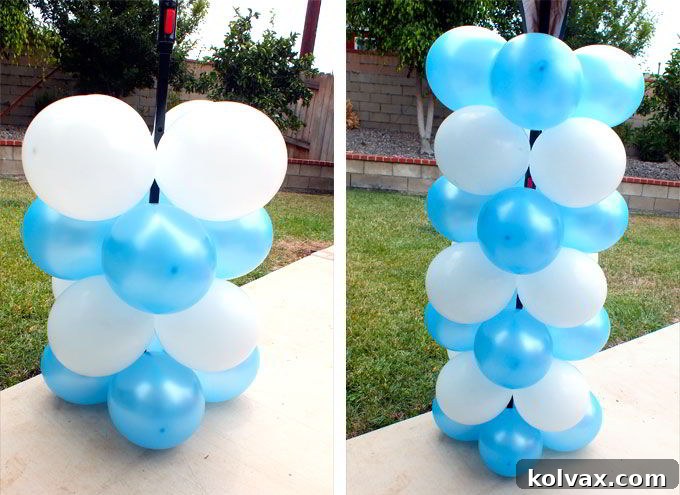 Layering and rotating quad balloon groupings to construct a full balloon column