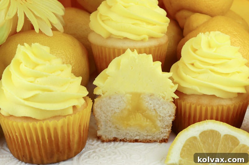 Lemon Burst Cloud Cupcakes 2 Luscious Lemon Cupcakes with Homemade Lemon Curd Filling and Light Whipped Cream Frosting