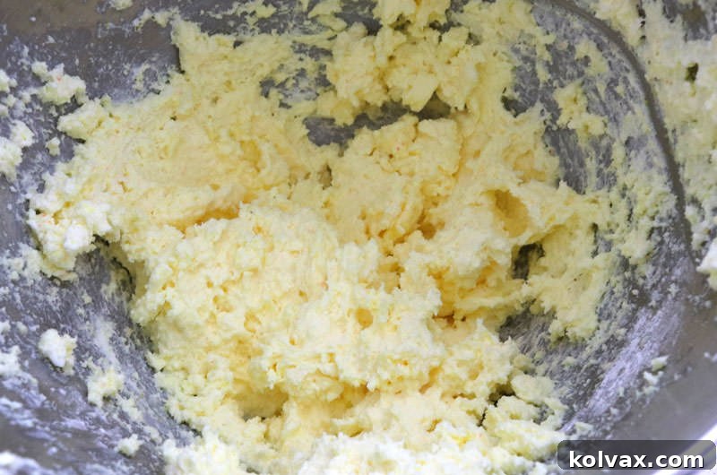Lemon Burst Cloud Cupcakes 5 Whipping Up The Best Lemon Whipped Cream Frosting for Cupcakes