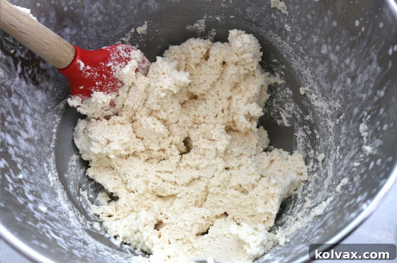 The final creamy texture of The Best Peanut Butter Whipped Cream Frosting, perfectly whipped and ready to be used for decorating cakes and cupcakes.