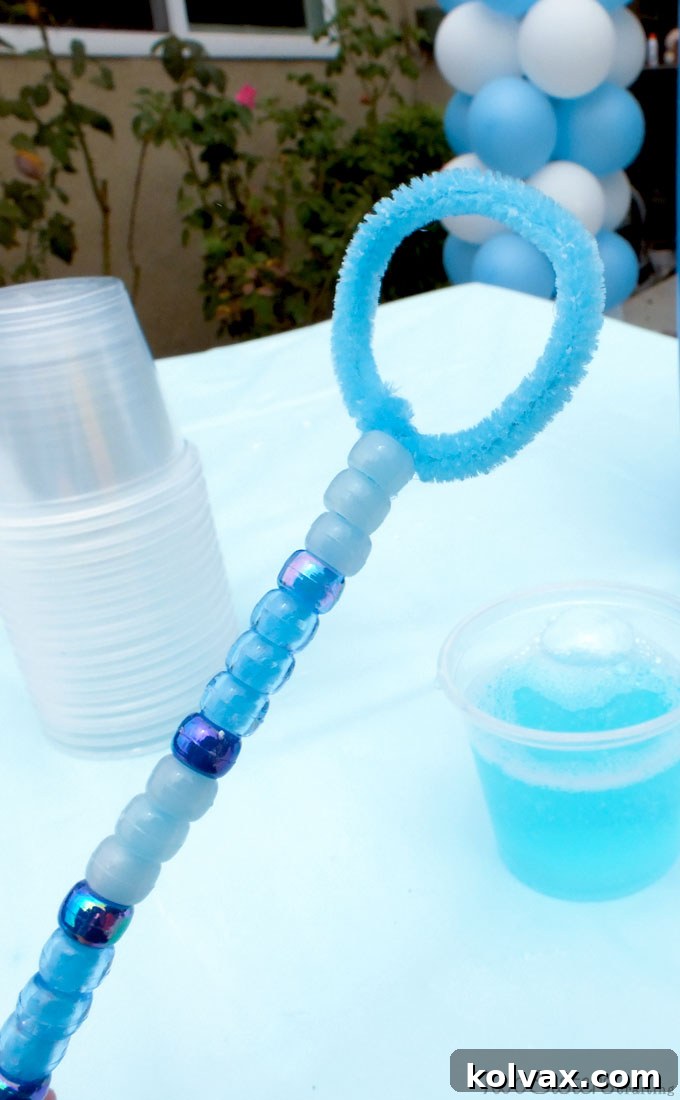 A stunning visual summary of DIY Disney Frozen Bubble Wands made with pipe cleaners and plastic beads, highlighting their impact as an easy party craft and excellent party favor. Perfect for a Frozen Birthday Party Bubble Station!