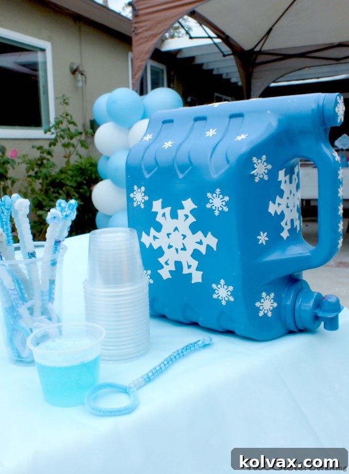 The complete Frozen Party Bubble Station set up for an outdoor birthday party, ready for kids to enjoy.