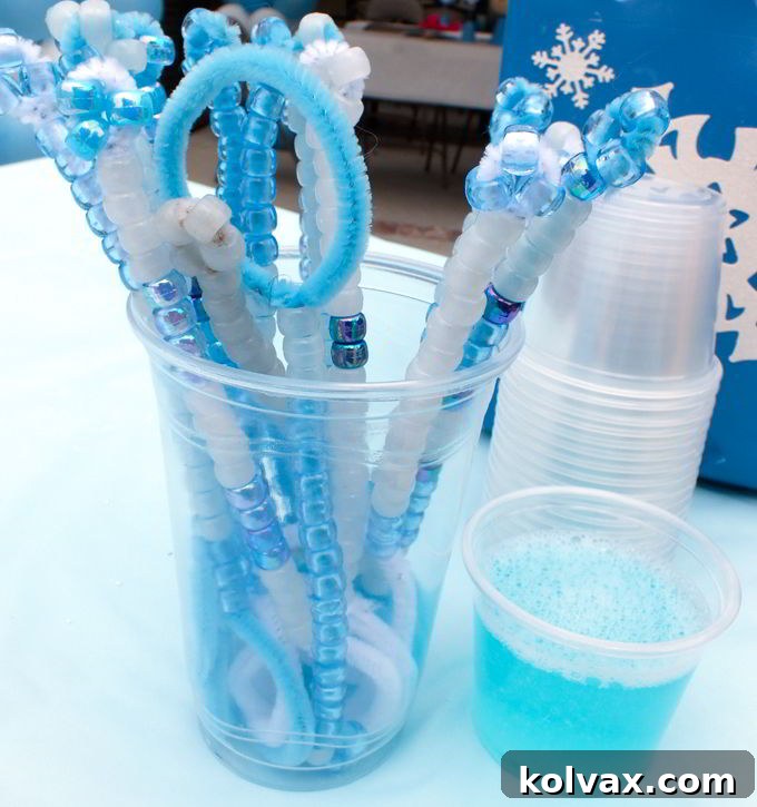 Kids using Frozen DIY Bubble Wands with the Frozen Bubble Station, refilling their small containers.