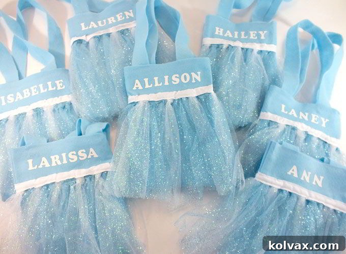 Disney Frozen Elsa Party Favor Bags - These DIY party favor bags were the hit of our Frozen Birthday Party. Pretty, sparkly and fit for an ice queen, the girls at the party loved them. Follow us for more fantastic Frozen Party Ideas.