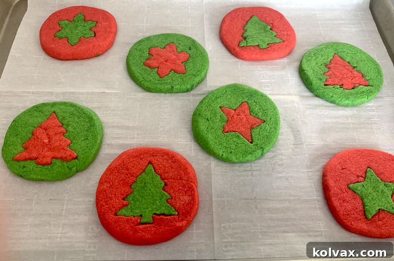 Cookie sheet full of freshly baked Holiday Butter Cookies, golden around the edges and perfectly set.