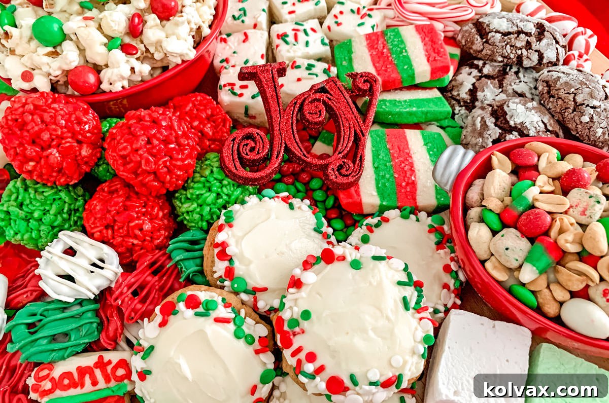 A beautifully arranged Christmas Dessert Board, brimming with festive cookies, candies, and holiday treats, creating a vibrant and inviting display.
