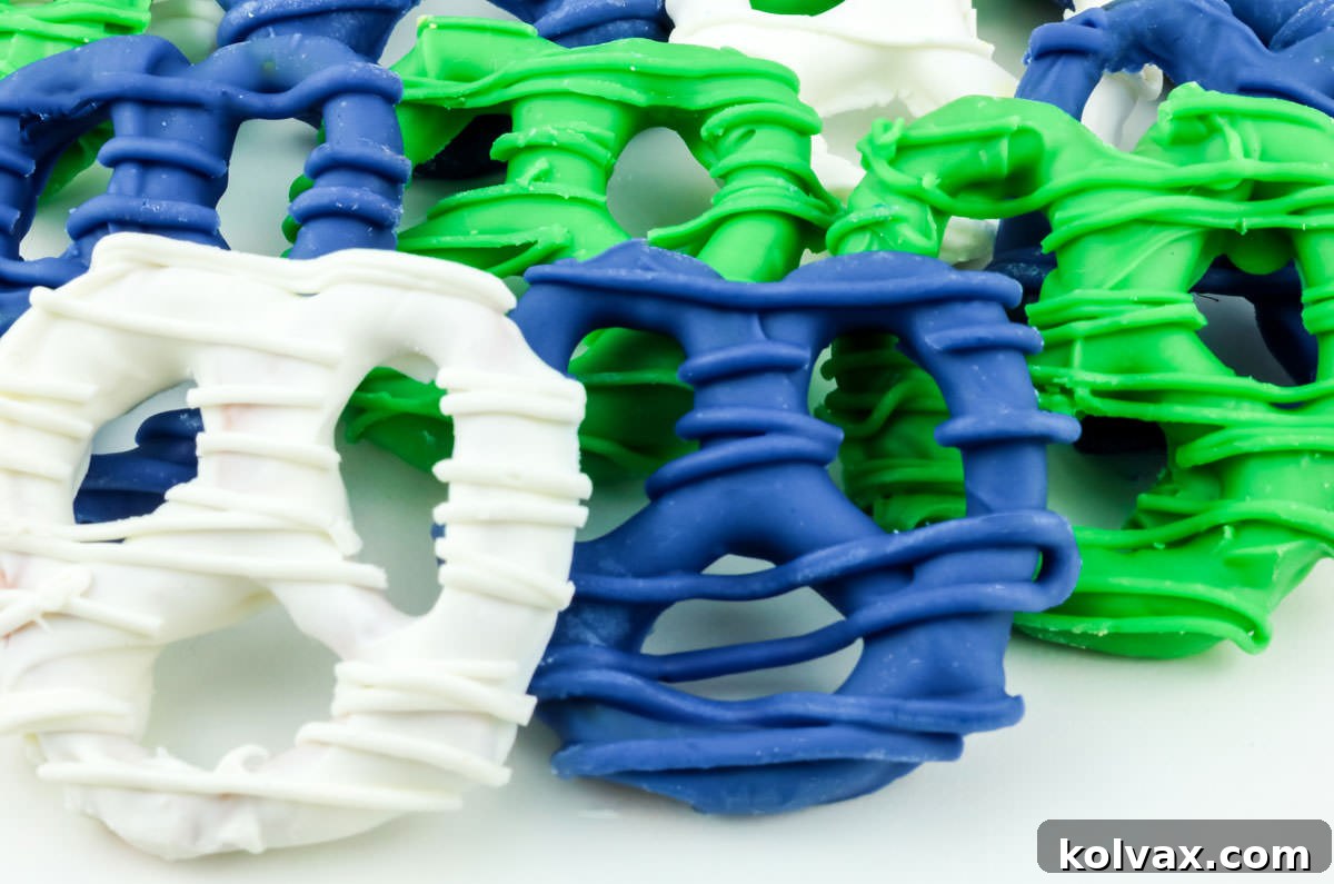 Closeup on three Seattle Seahawks Pretzels in White, Blue and Green.