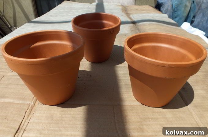 Terra cotta pots and saucers ready to be transformed into Disney Frozen Centerpieces, the perfect base for your DIY party decorations.