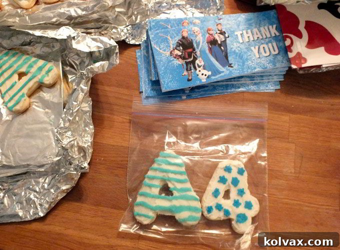 Assembling thank you cookie favors by placing cookies in bags and attaching labels