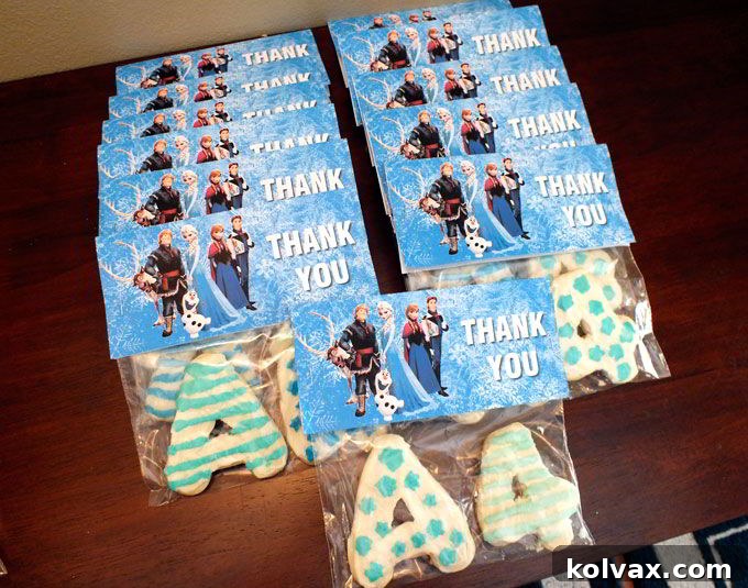Display of packaged Frozen party favor cookies near the exit for guests