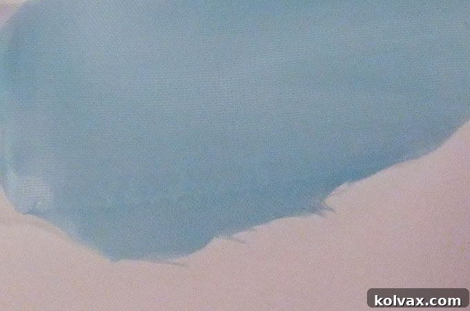 Applying Seam Sealant to Elsa Cape Fabric