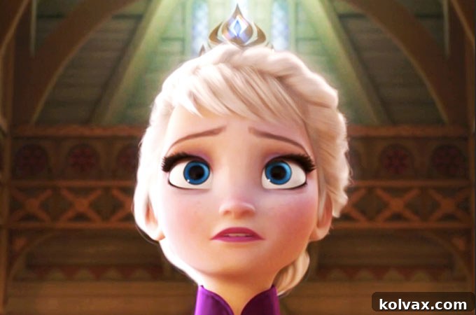 A beautiful close-up of the finished Queen Elsa's crown, sparkling with glitter and a rhinestone.