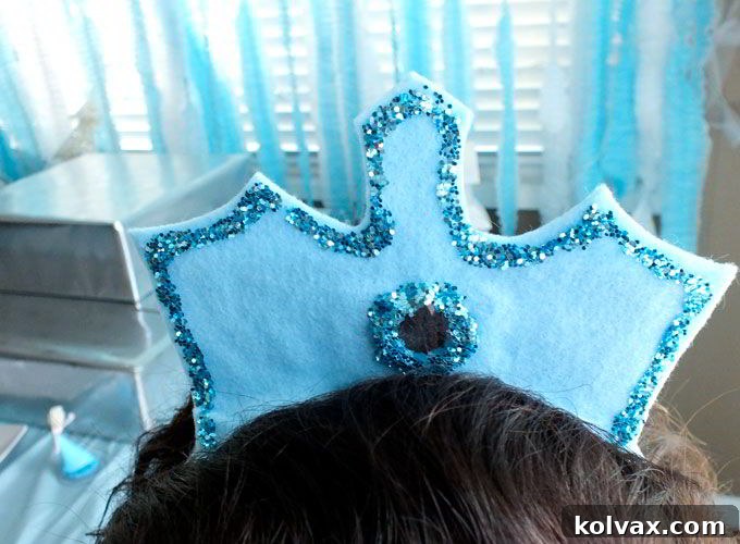 A collection of dazzling Disney Frozen Elsa Crowns, handmade and ready as enchanting party favors for a Frozen birthday party.