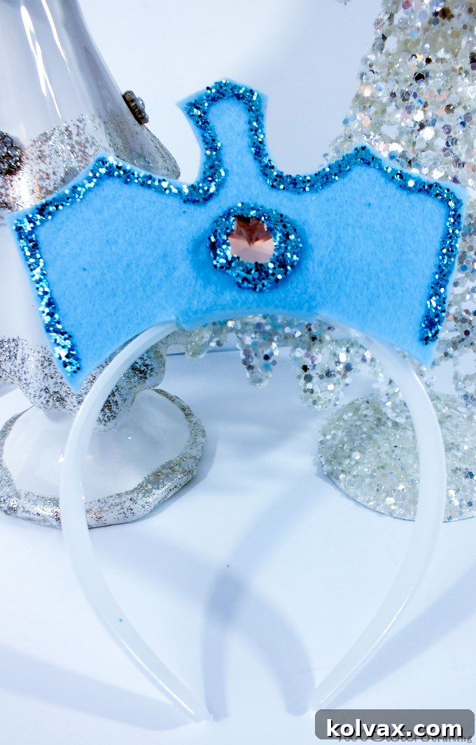 A festive Frozen party scene featuring Disney Frozen Elsa Crowns being worn, adding a touch of magic to the celebration.
