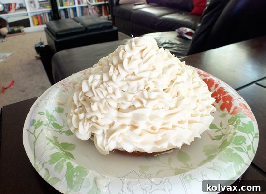 Mickey Mouse Celebration Cupcake Cake 4 Close-up of the top half of the Mickey Mouse Cupcake Cake, adorned with elegant white buttercream in whimsical squiggly lines.