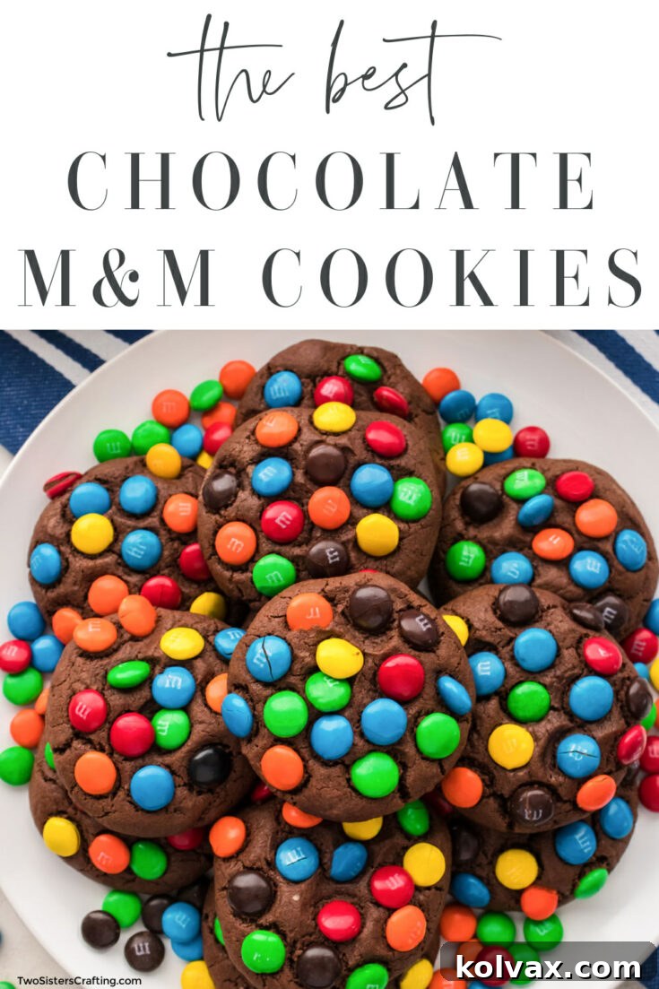 A chocolate M&M cookie with vibrant candies.