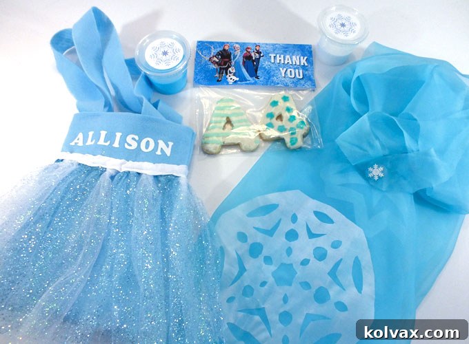 Collection of adorable DIY Frozen Birthday Party Favors for Girls including Elsa Capes, Elsa Party Favor Bags, Elsa Crown, Troll Slime, and Thank You Cookies, set against a magical blue backdrop.