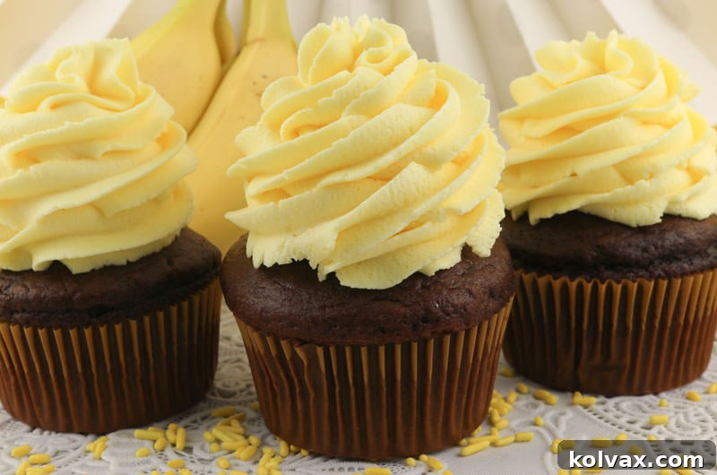 Delightfully light and creamy Banana Whipped Cream Frosting on cupcakes