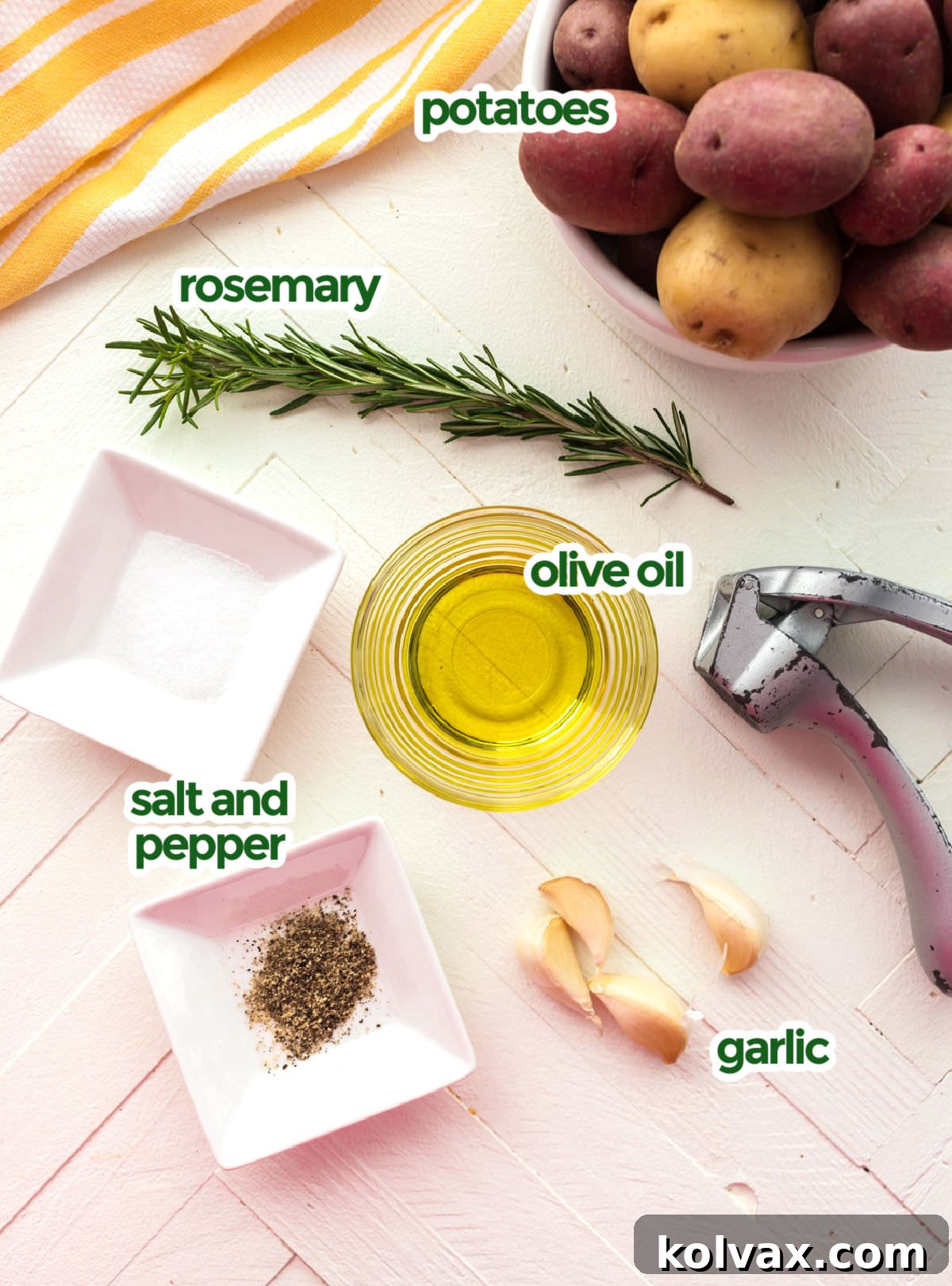 All the ingredients you will need to make Crispy Garlic Roasted Potatoes including Baby Potatoes, Olive Oil, Garlic, Rosemary, Salt and Pepper.