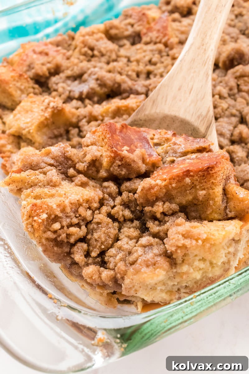 Maple Glazed French Toast Casserole 9 A beautiful French Toast Breakfast Casserole, fresh out of the oven in a glass baking dish, golden brown and ready to be served with maple syrup icing.