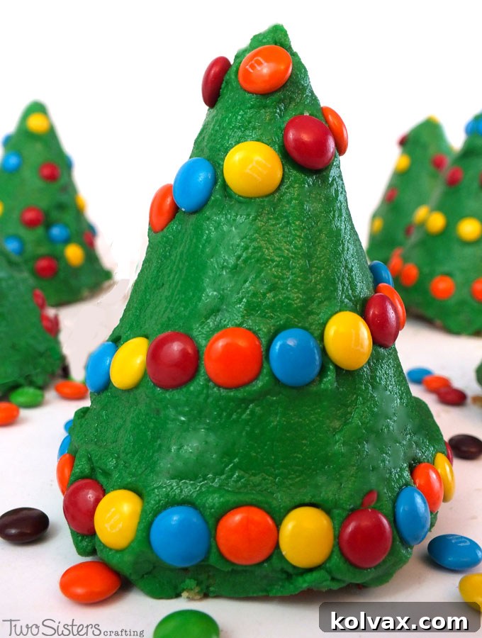 A festive display of decorated Christmas Tree Cupcakes, perfect for holiday gatherings
