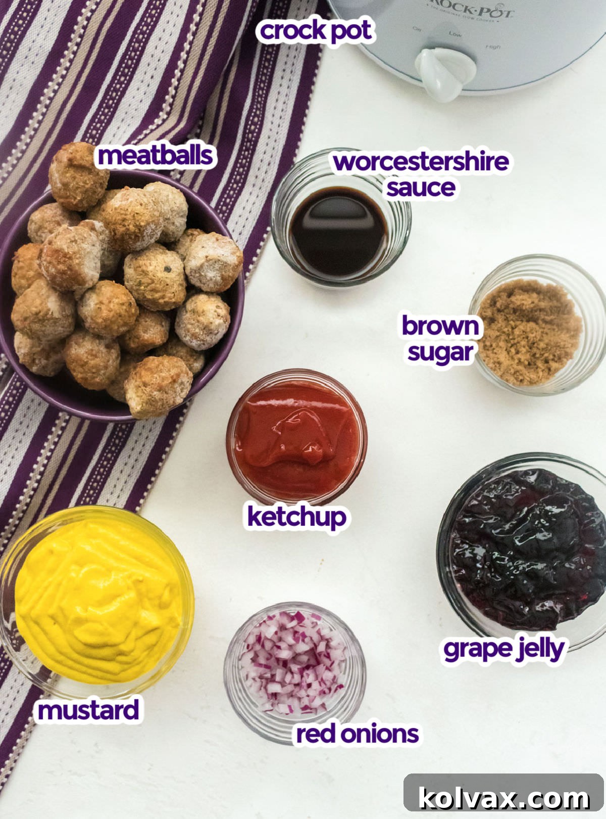 All essential ingredients for making Grape Jelly Meatballs laid out: frozen meatballs, Worcestershire Sauce, brown sugar, ketchup, mustard, red onion, and a jar of grape jelly.
