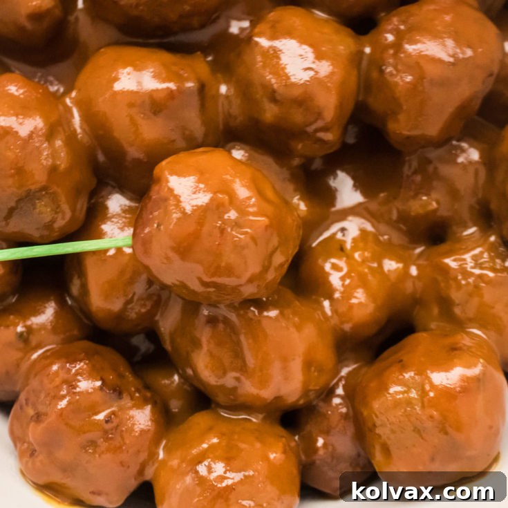 Grape Jelly Meatballs, a classic sweet and savory party appetizer cooked in a crockpot.