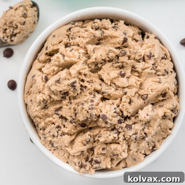 Edible Cookie Dough in a white bowl with a spoon