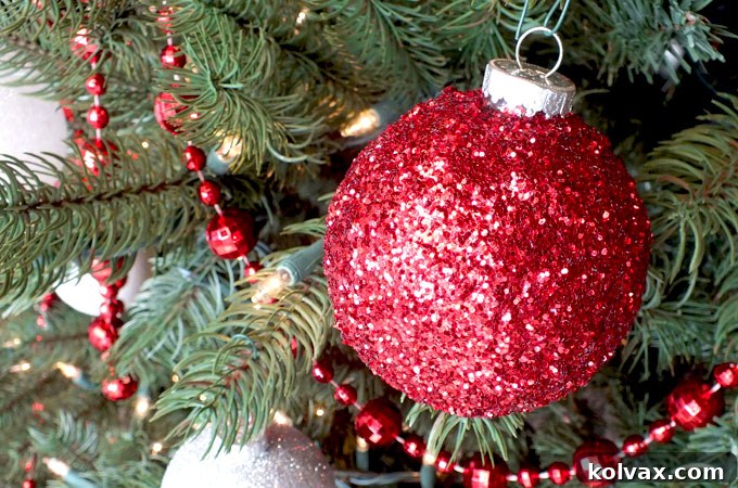 Create beautiful, sparkling Red Glitter Christmas Tree Ornaments with this easy DIY guide. Learn how to make unique, handmade decorations that will truly shine on your Christmas tree for years to come. Pin this fun Christmas craft for later and explore more great Christmas decoration ideas!