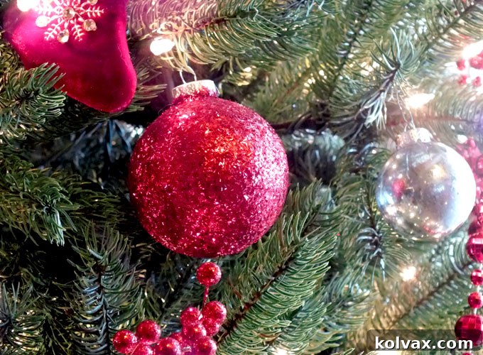 Close-up of sparkling Red Glitter Christmas Tree Ornaments, highlighting their dazzling effect and ease of creation for a unique holiday display.