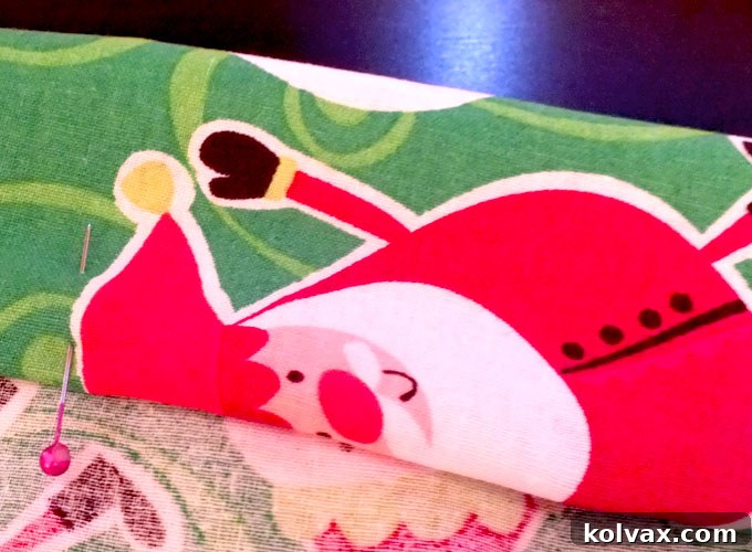 Pinning the cuff for a DIY Christmas pillowcase