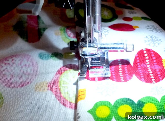 Sewing the cuff on a DIY Christmas pillowcase