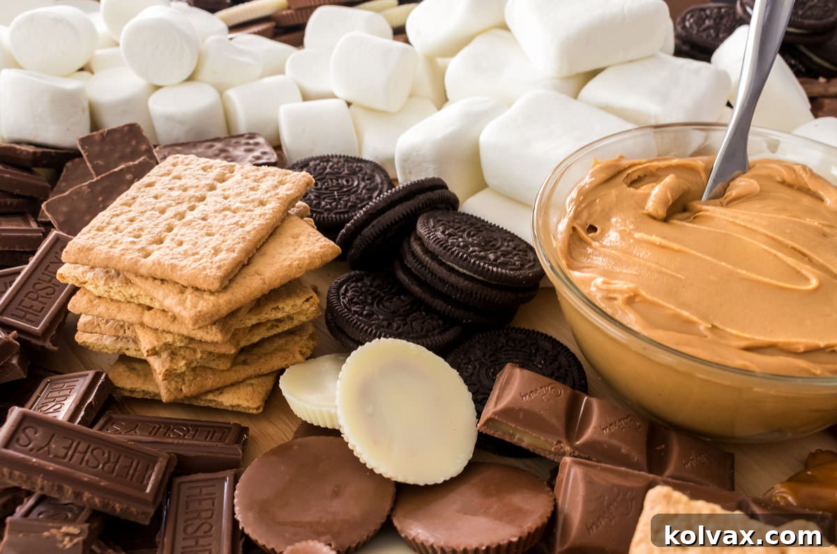 Closeup of a S'mores Dessert Board featuring marshmallows, cookies, chocolate and peanut butter, inviting guests to create their perfect S'more.