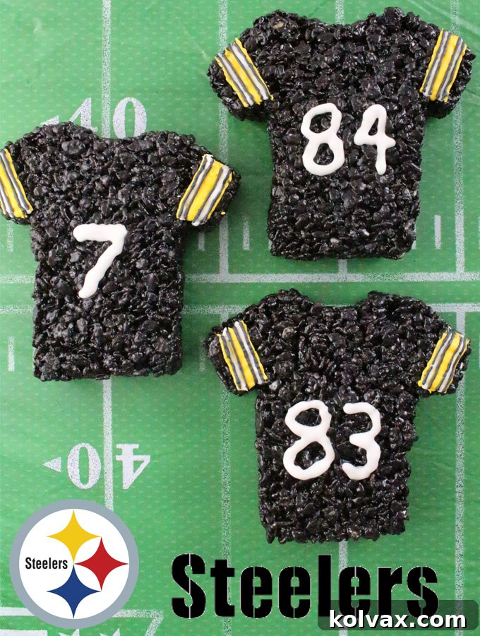 These Pittsburgh Steelers Rice Krispie Treats Team Jerseys are a fun football dessert for a game day football party, an NFL playoff party, a Super Bowl party or as a special snack for the Pittsburgh Steelers fans in your life. Go Steelers! And follow us for more fun Super Bowl Food Ideas.