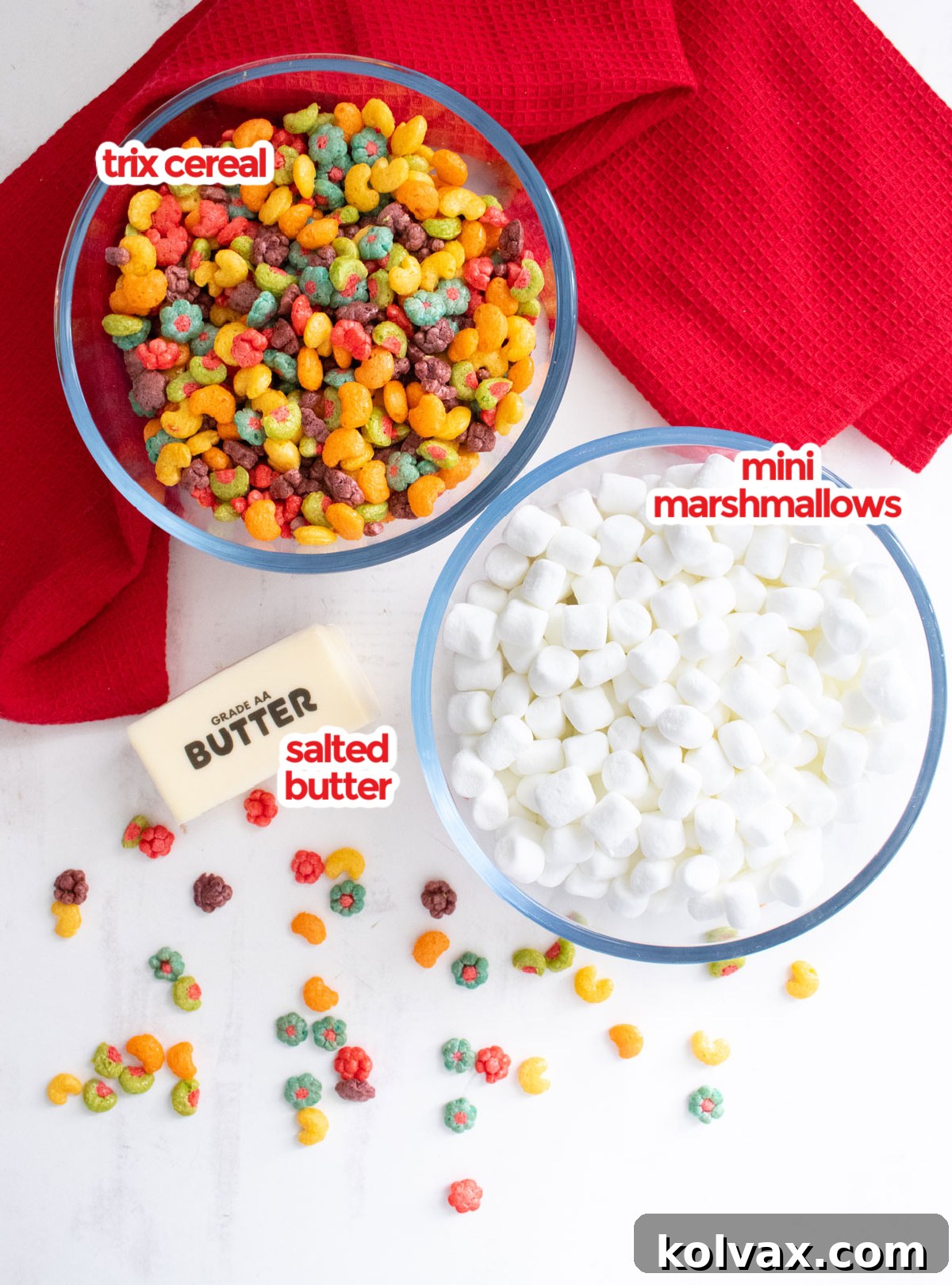 Trix Fruity Marshmallow Squares 3 All the necessary ingredients laid out for making Trix Marshmallow Treats: butter, mini marshmallows, and Trix cereal.