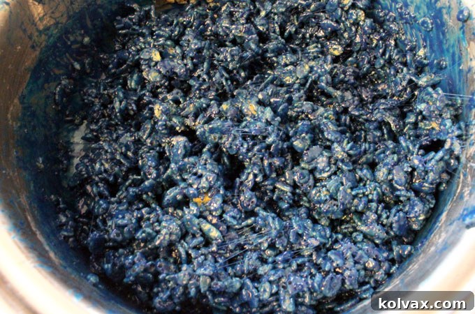 Add Rice Krispie Cereal to the melted marshmallow mixture