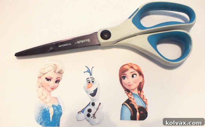 Warmth for the Winter Heart 11 Cutout images of Elsa, Anna, and Olaf's faces for the Frozen craft