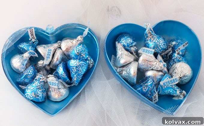 Warmth for the Winter Heart 14 Filling the inside of a Frozen Heart ornament with Hershey's Kisses