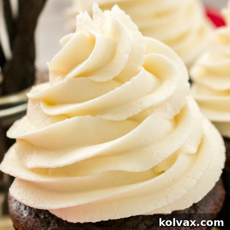 The Best Buttercream Frosting recipe card image featuring a beautifully frosted cupcake.