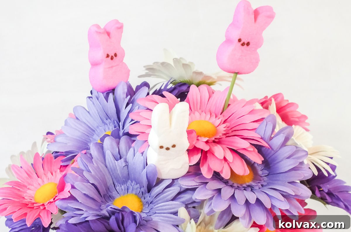 Sweet Peeps Easter Display 7 Closeup of the flowers in the Easter Peeps Candy Centerpiece including the Peeps Bunny decorations, poking out cheerfully.