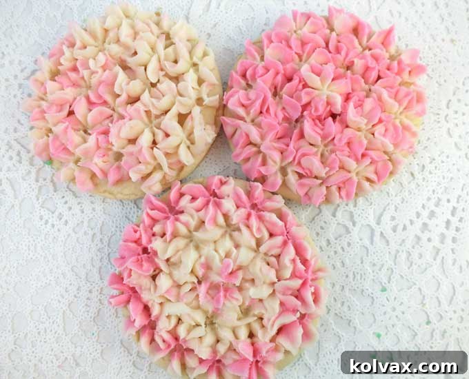 Whimsical Hydrangea Sugar Cookies 11 A collection of exquisitely decorated pink and ivory Hydrangea Frosted Sugar Cookies