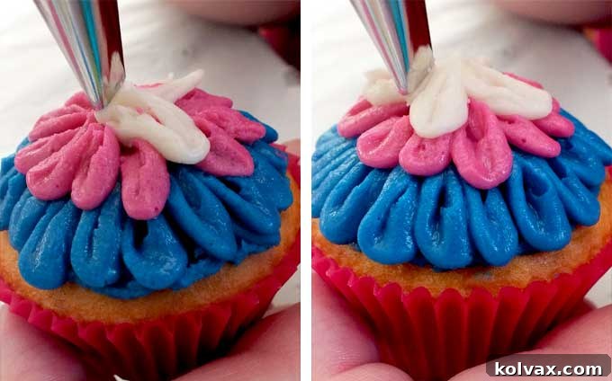 Close-up view of a partially decorated Frozen Anna Cupcake, showcasing the transition from blue to pink frosting petals.