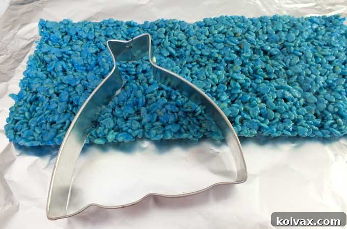 Using a wedding dress to cut out a Elsa Dress Rice Krispie Treats