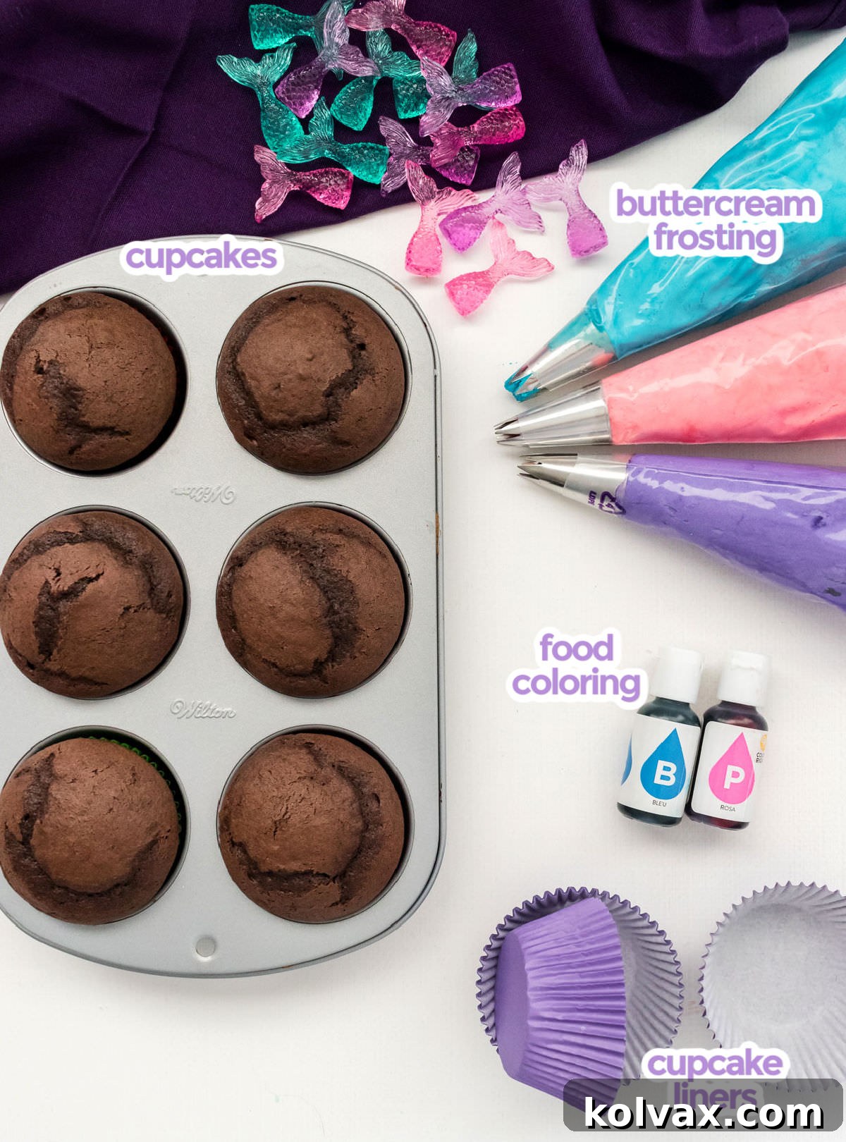 All the ingredients you will need to make Mermaid Cupcakes including cupcakes, buttercream frosting, food coloring and cupcake liners.