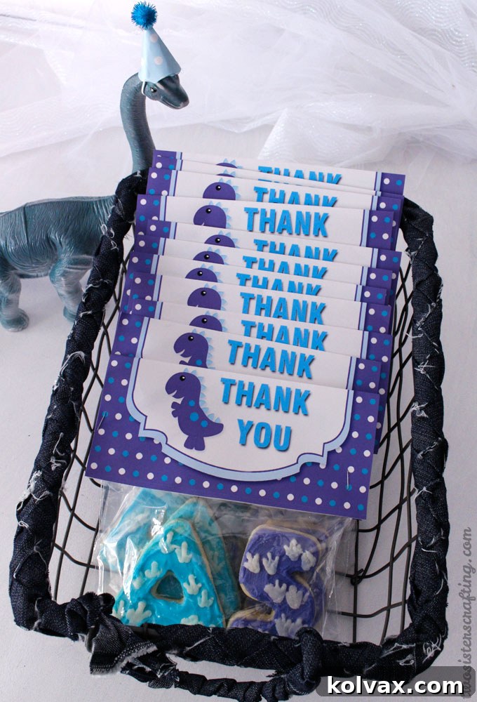 Dinosaur Party Thank You Cookies displayed by the front door, ready to be given to departing guests.