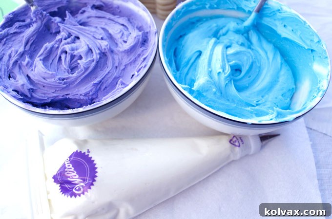 Rich, creamy buttercream frosting prepared for coloring and decorating cookies.
