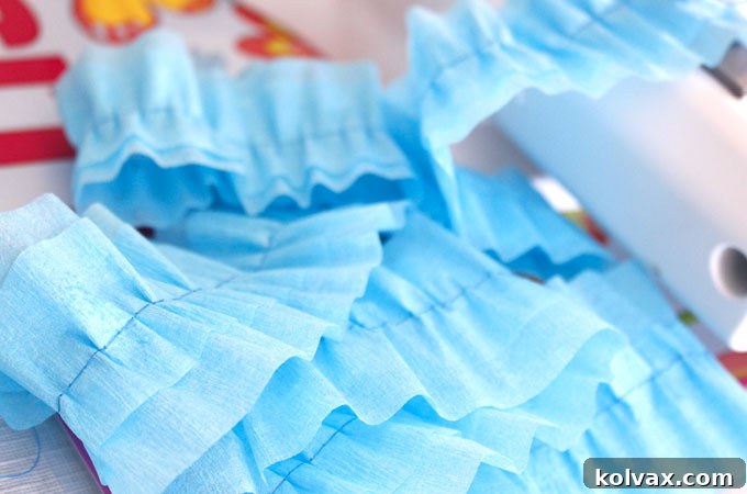 Make Stunning Ruffled Streamers 5 Close-up of a sewing machine needle creating ruffles on a crepe paper streamer, demonstrating how increased tension automatically gathers the material as it's sewn.