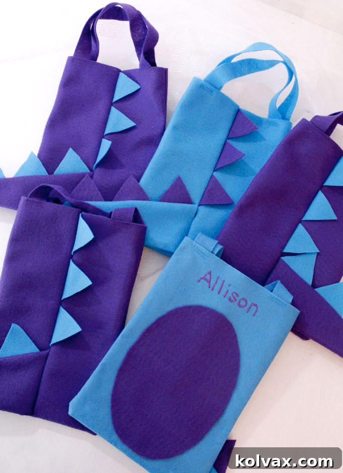 A collection of adorable handmade Dinosaur Party Favor Bags in various colors, showcasing their unique design with felt spikes and underbellies, perfect for a themed birthday party.